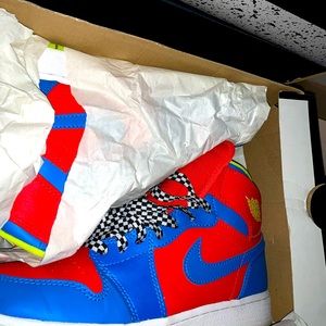 Red , blue , white Jordan 1’s